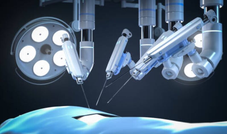 Diagram of laparoscopic appendectomy showing abdominal ports and instruments; inset shows the appendix being removed.